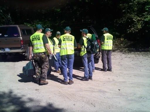 CERT volunteers wearing high-visibility vests outdoors